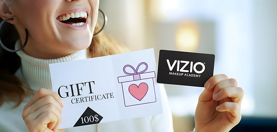 woman happy to get a gift card from vizio Makeup Academy